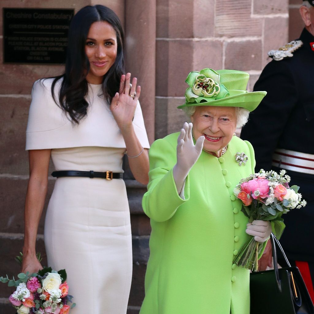 Queen Elizabeth II and Meghan, Duchess of Sussex leaving Chester Town Hall