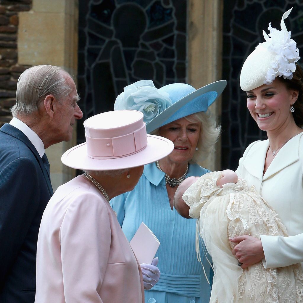 the duke gazed at his great granddaughter princess charlotte at her christening in 2015 