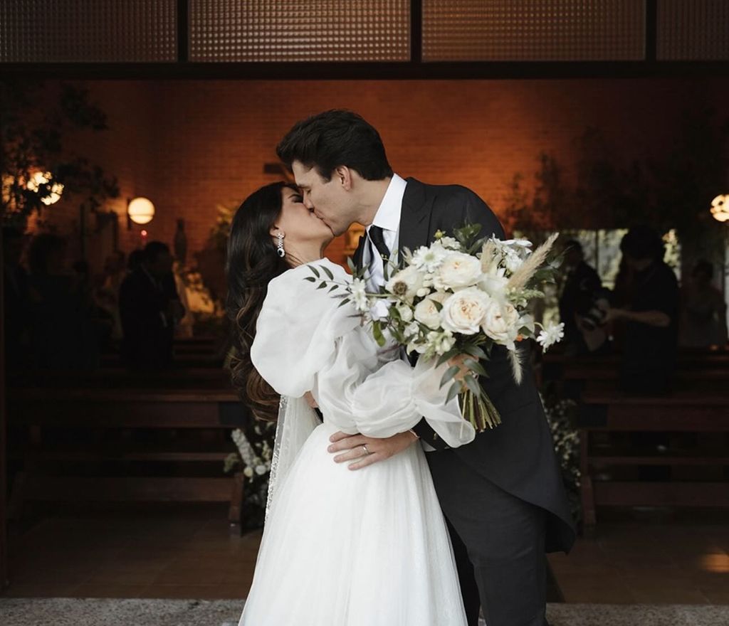 Paulina Peña y su esposo, Fernando Tena, el día de su boda.