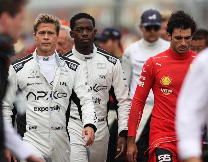 Brad Pitt con Damson Idris y Carlos Sainz Jr.