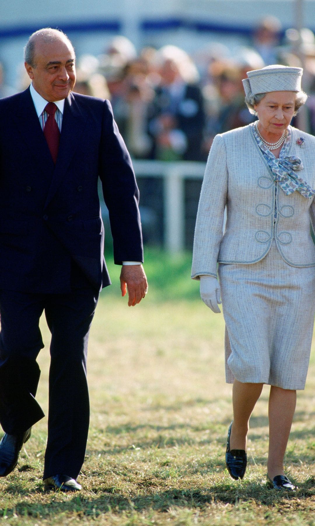 La reina de Inglaterra con Mohamed Al Fayed