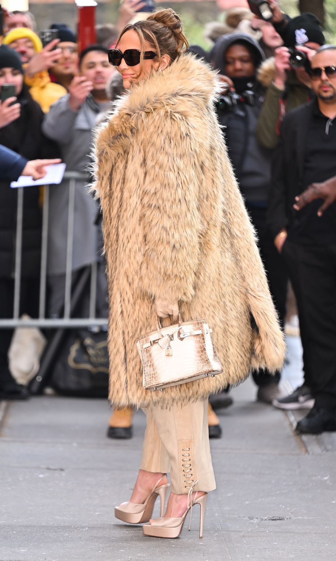 NEW YORK, NEW YORK - FEBRUARY 15:  Jennifer Lopez leaves ABC's "The View" on the Upper West Side on February 15, 2024 in New York City. (Photo by James Devaney/GC Images)