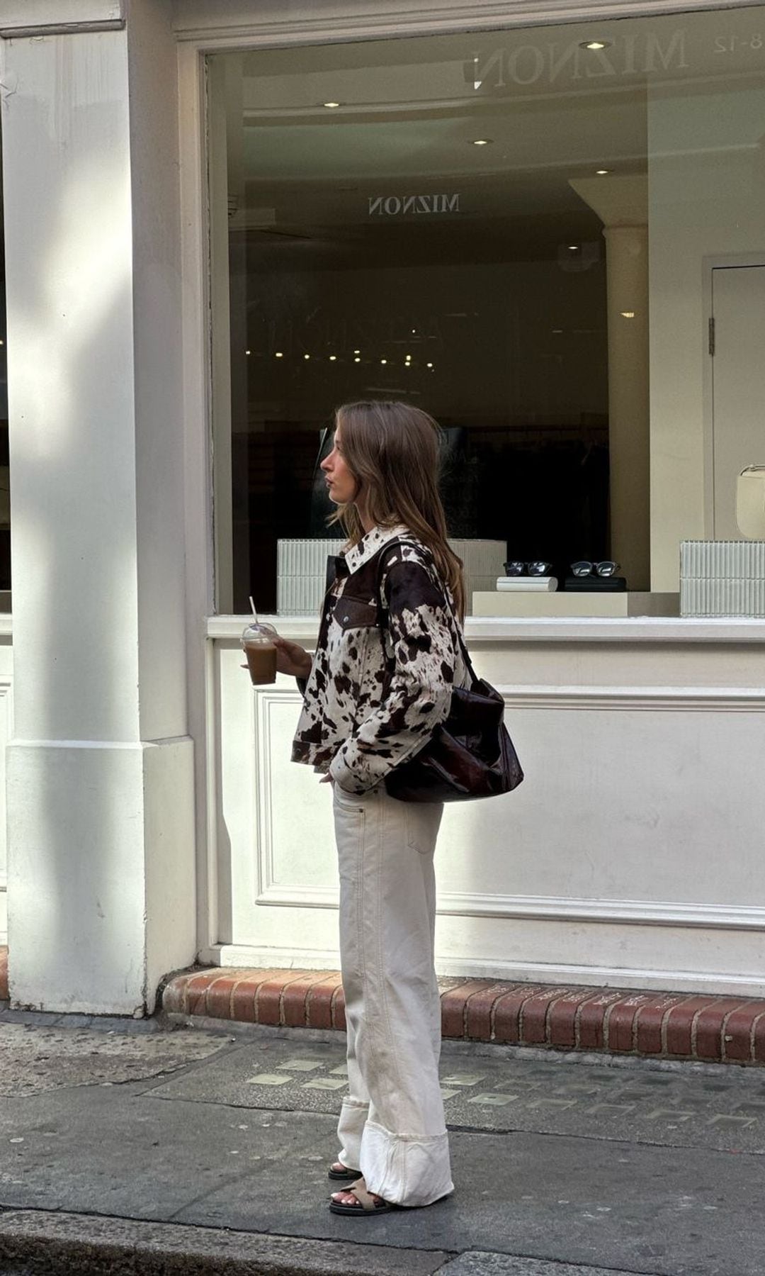 Animal print jacket and white pants