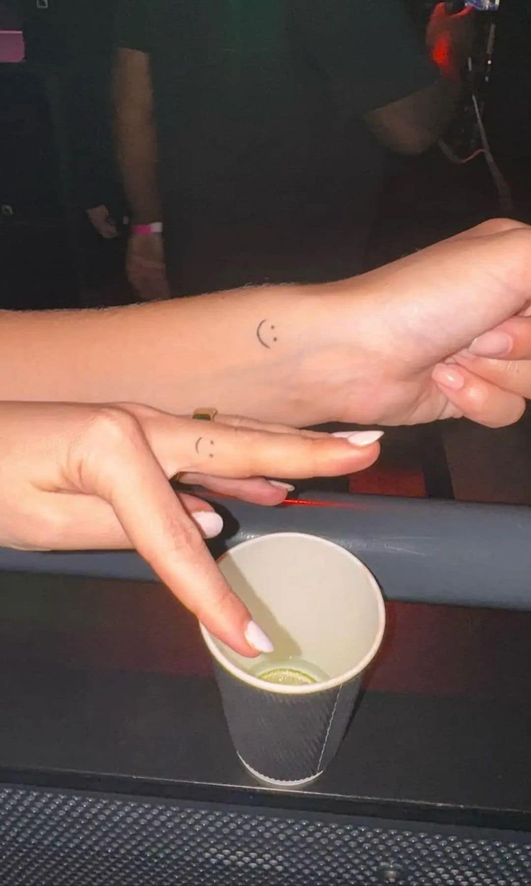 Tatuaje de un 'smiley'