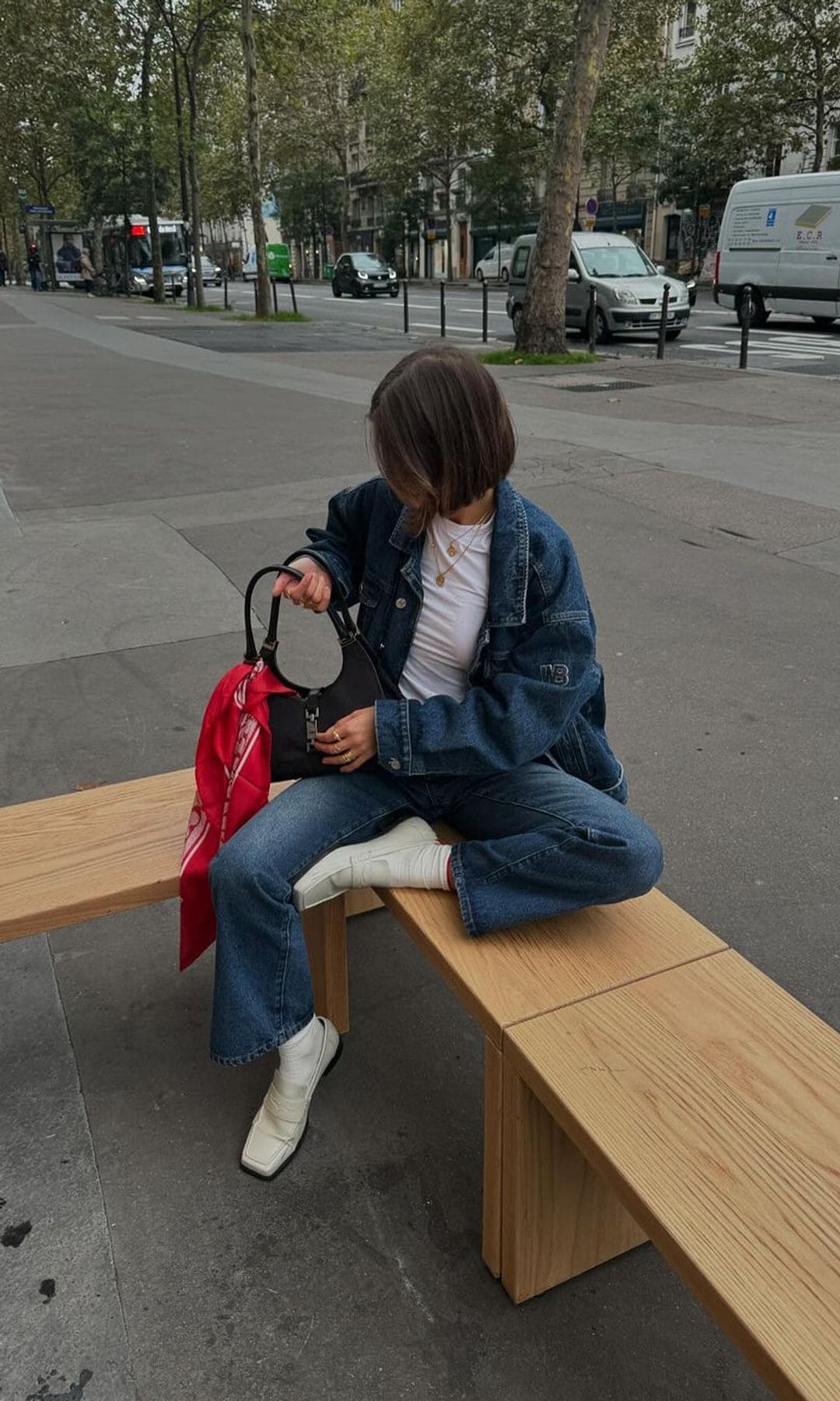 Total denim look with white top and white boots