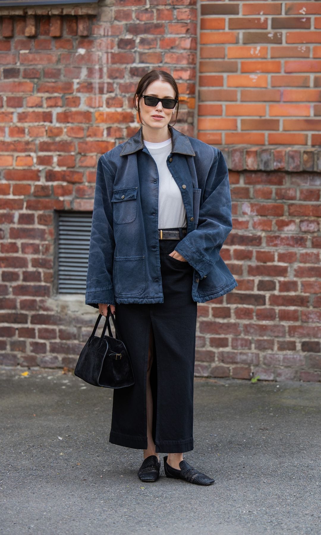 denim jacket with black midi skirt