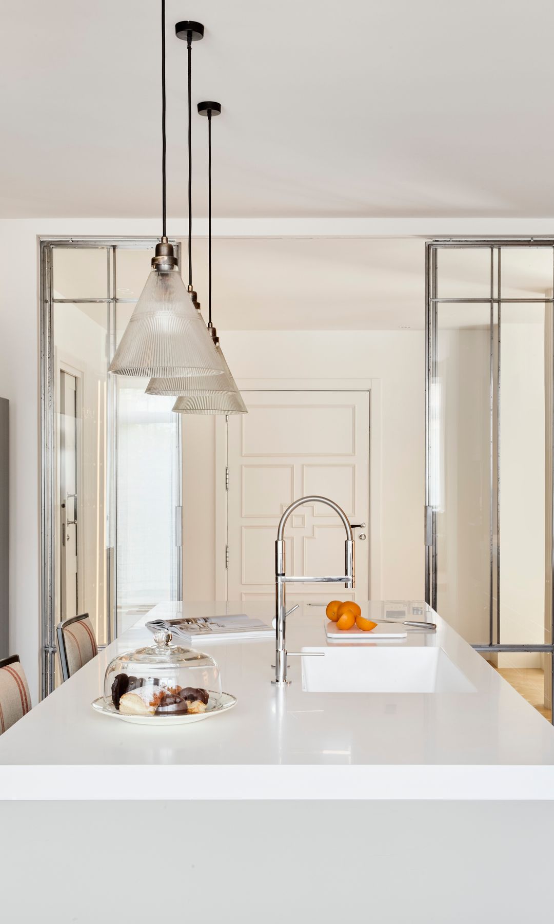 Cocina con cerramiento de cristal