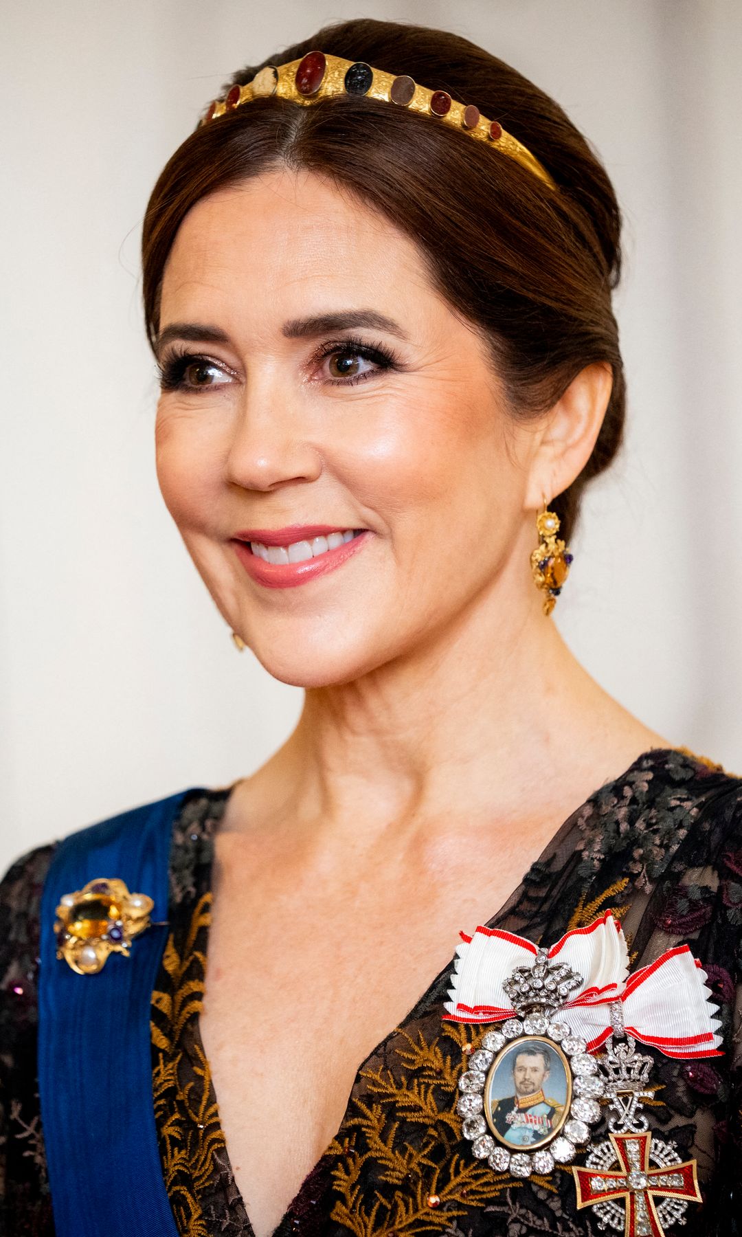 Queen Mary of Denmark smiles during a gala dinner at the Presidential Palace in Helsinki, Finland, on March 4, 2025 during a 2-day state visit of the Danish royal couple to Finland. (Photo by Ida Marie Odgaard / Ritzau Scanpix / AFP) / Denmark OUT (Photo by IDA MARIE ODGAARD/Ritzau Scanpix/AFP via Getty Images)          