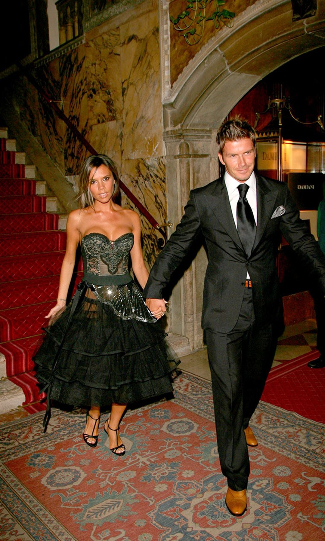 Victoria y David Beckham look negro elegante