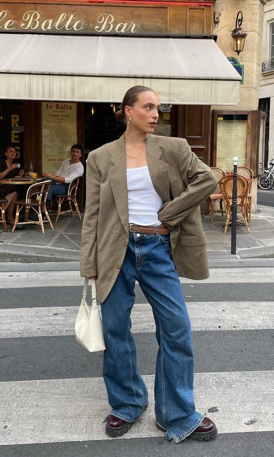 oversized blazer with shoulder pads and jeans