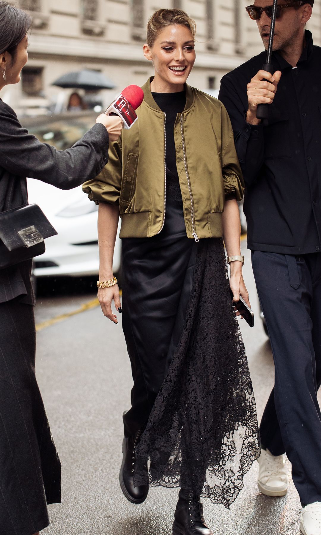 Olive green bomber jacket with lace skirt and military boots