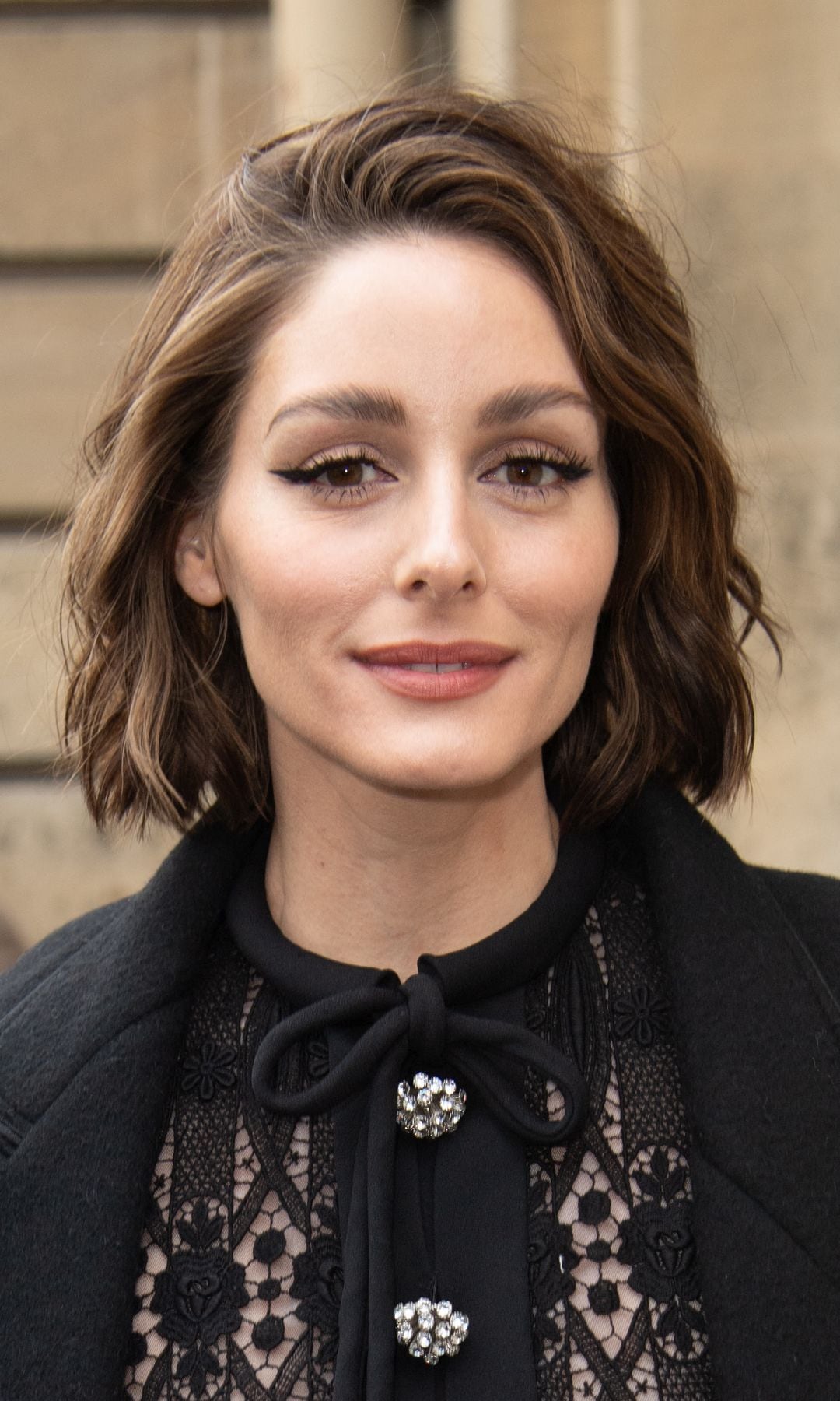 Olivia Palermo with wavy bob and black look