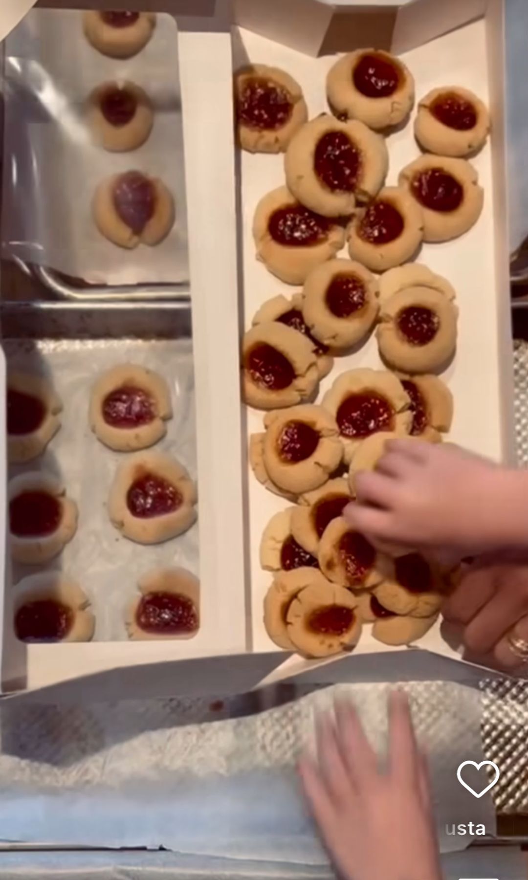 Archie helped Meghan place the cookies already baked in a box.