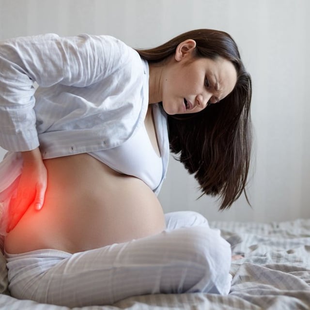 mujer embarazada con dolor lumbar