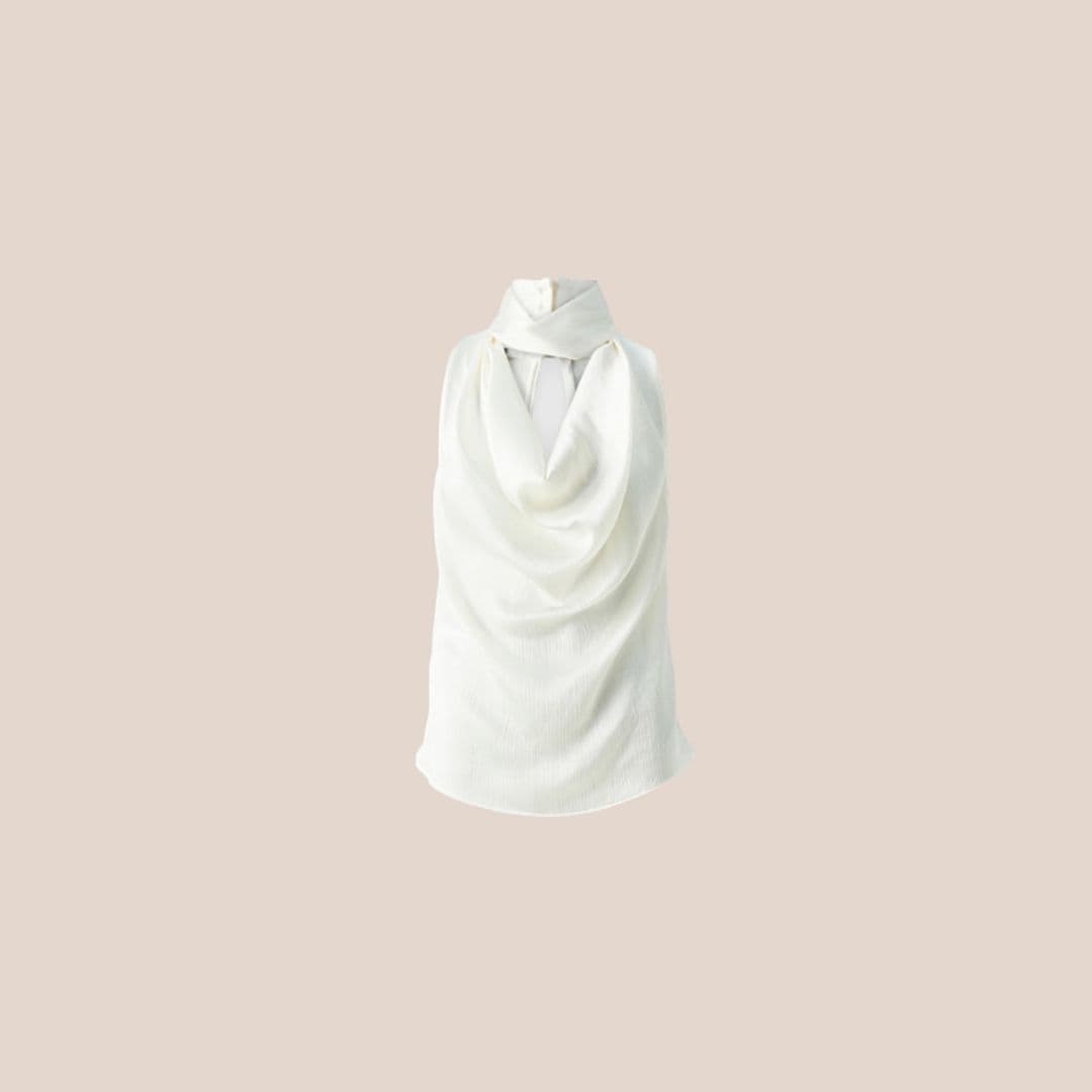 White blouse with draping at the neck