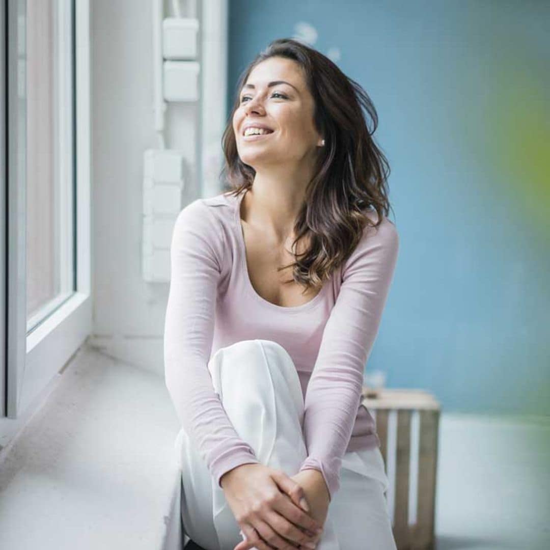 getty mujer joven feliz