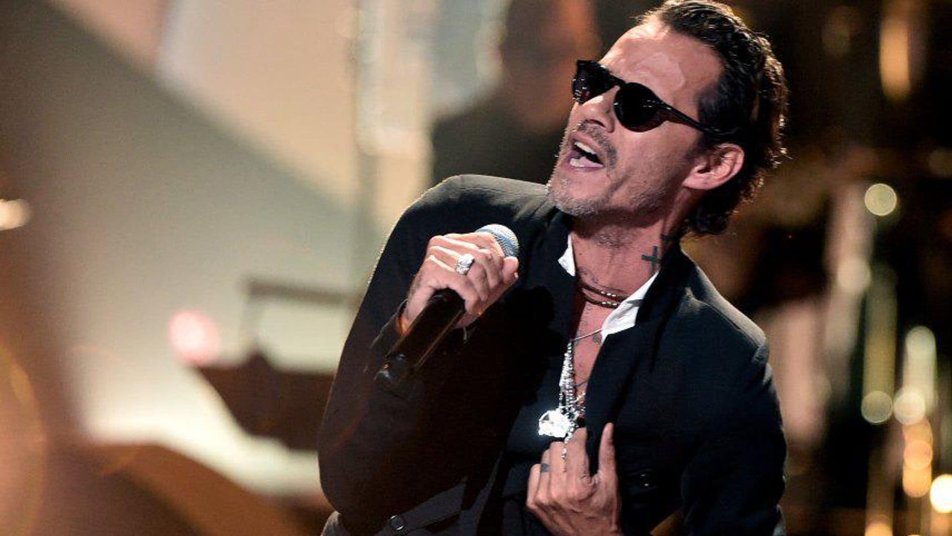 Marc Anthony and his 'mini-me' sharing the stage is the cutest thing you'll see today