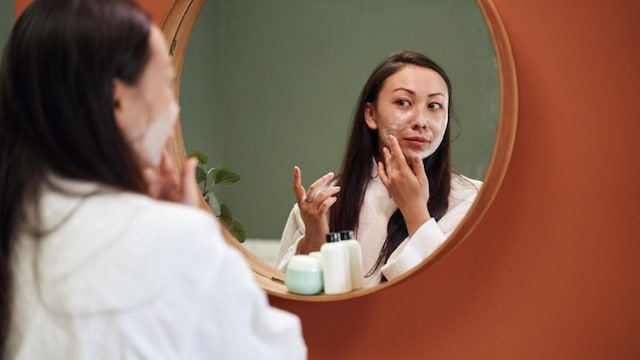 woman washing face