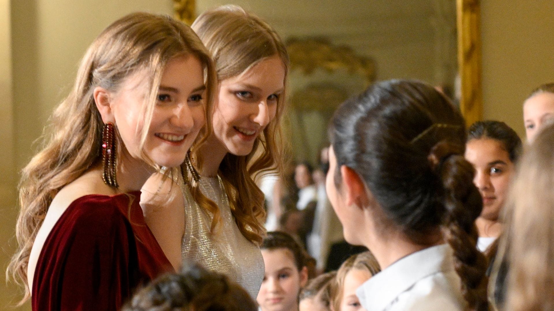 Princesses wear festive dresses to a Christmas concert at the palace