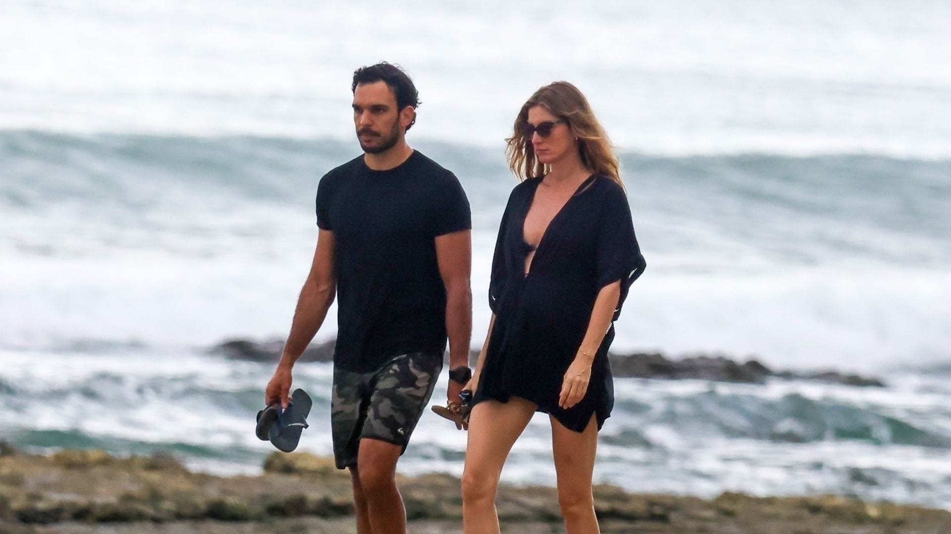 Watch Gisele Bündchen and Joaquim Valente enjoy their beach day with strolls and surfing