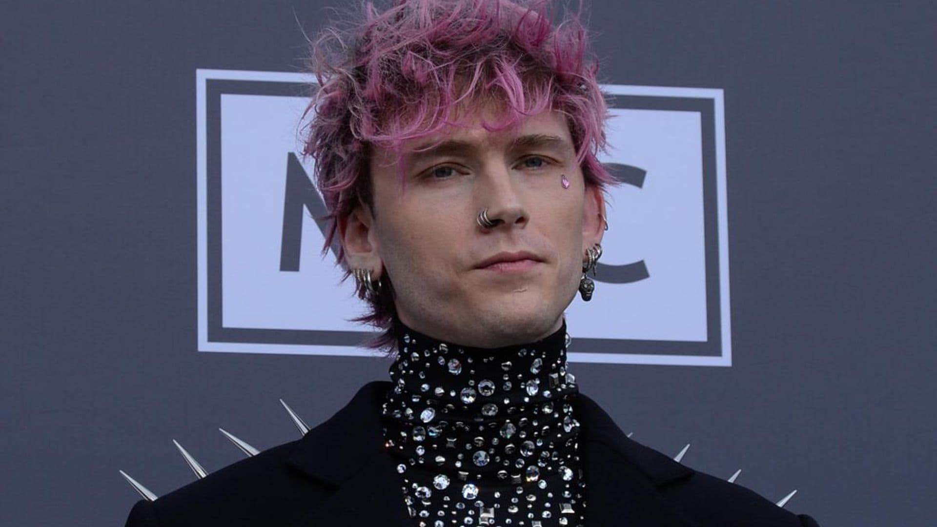 Machine Gun Kelly wears $30,000 diamond manicure auctioned for charity