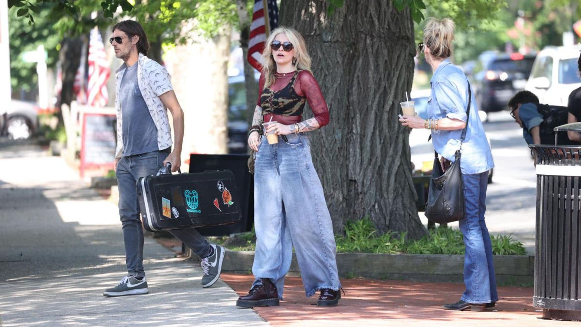 Paris Jackson is seen in The Hamptons accompanied by her bandmates.