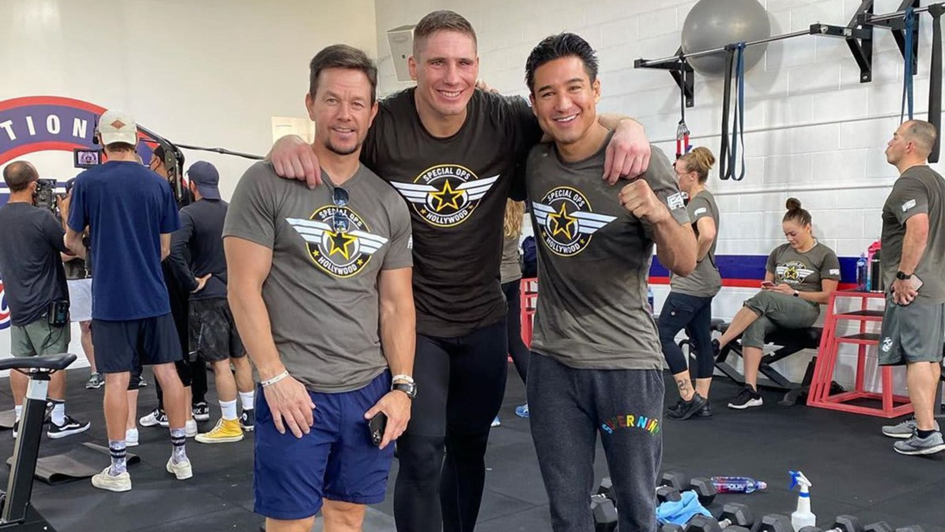 Mark Wahlberg leads a fitness class and coaches Mario Lopez [Pictures]