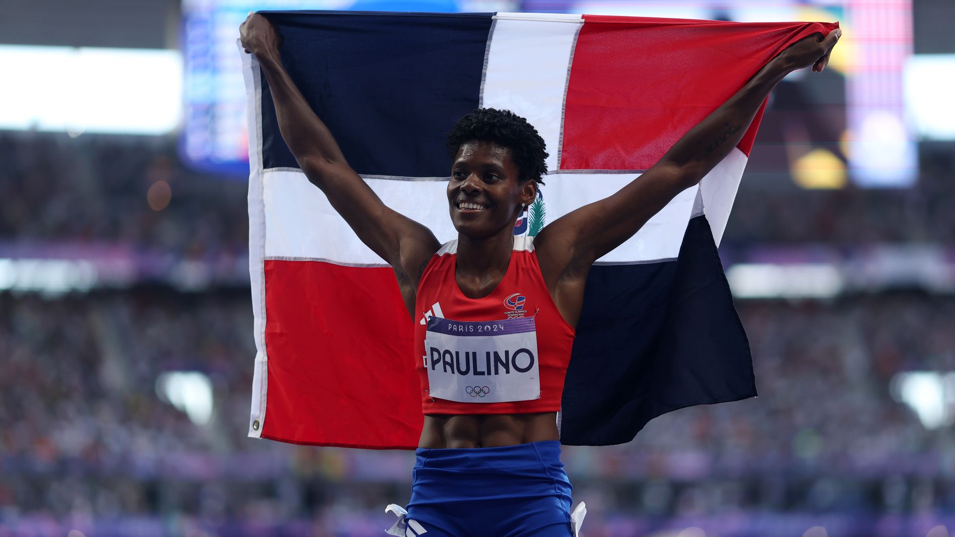 Marileidy Paulino of Team Dominican Republic celebrates winning gold in the Women's 400m Final on day fourteen of the Olympic Games Paris 2024 at Stade de France on August 09, 2024 in Paris, France. (Photo by Christian Petersen/Getty Images)