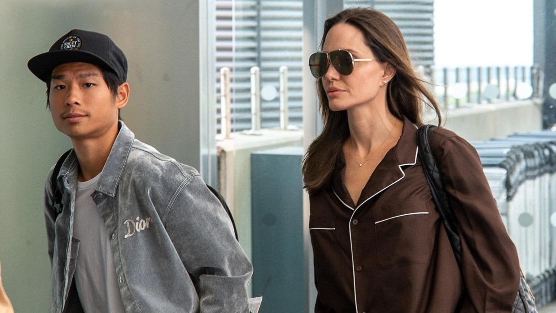 Angelina Jolie & Pax board a flight in their pajamas