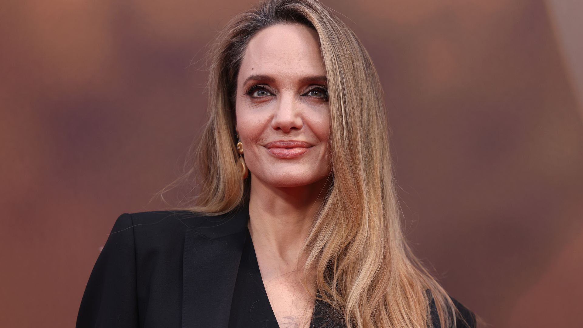 Angelina Jolie reportedly snuck in rumored boyfriend Akala to London hotel