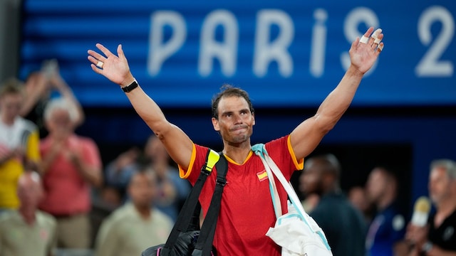 Rafael Nadal of Spain waves to the crowd after losing in the Men's Double Quarterfinal on day five of the Olympic Games Paris 2024 at Roland Garros on July 31, 2024, in Paris, France. (Photo by Eurasia Sport Images/Getty Images)