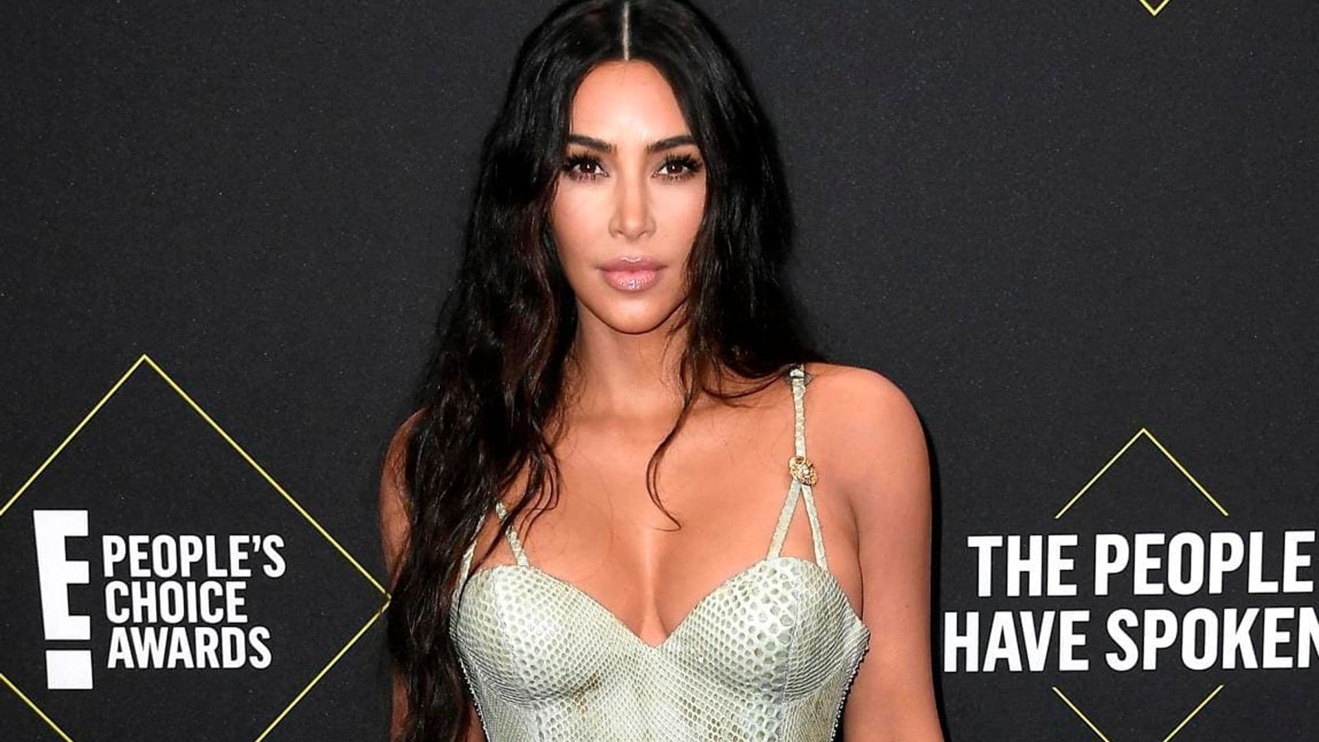 Kim Kardashian went night swimming in a sexy snake print string bikini