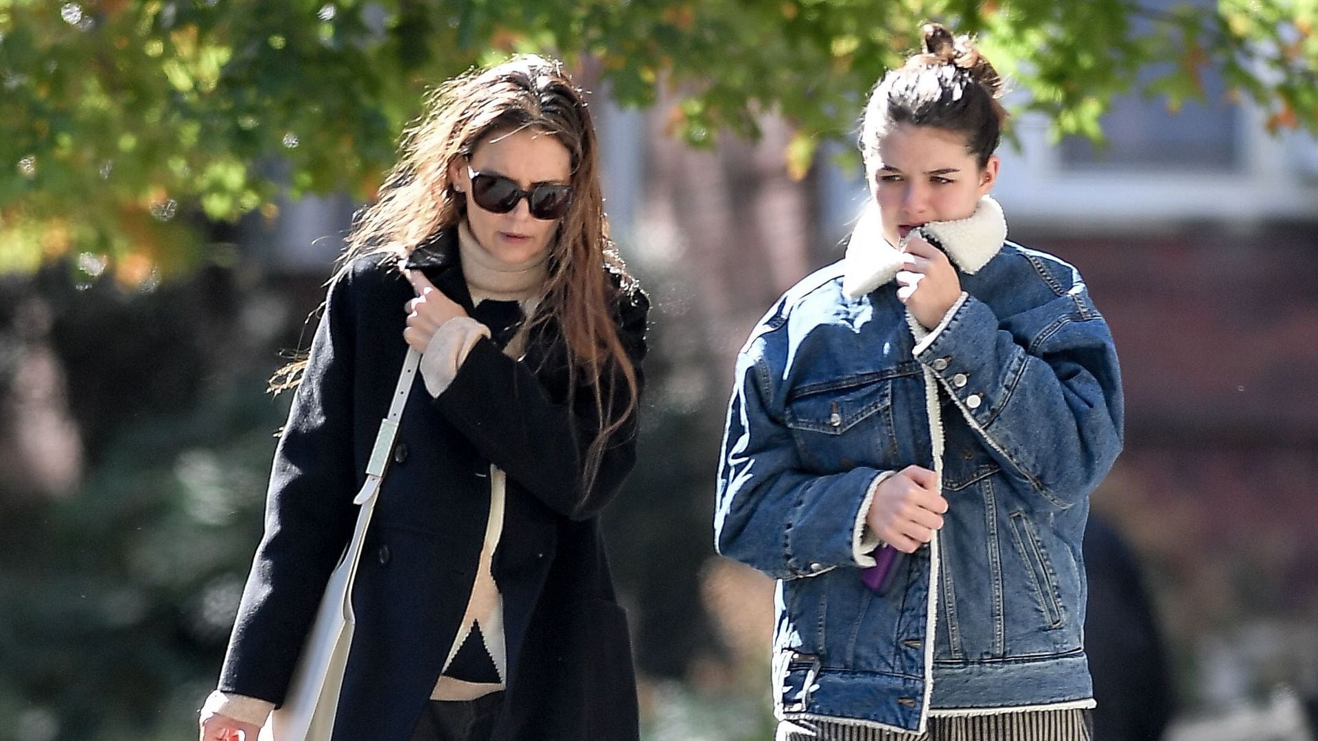 Suri Cruise takes a break from college and returns to New York City to spend time with Katie Holmes