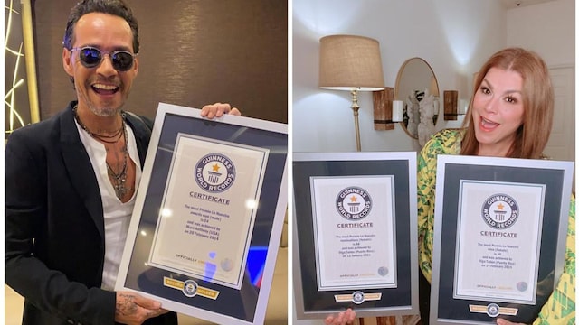 Olga Tanon and Marc Anthony holding their third GUINNESS WORLD RECORDS title for the most Premio Lo Nuestro nominations and winnings.