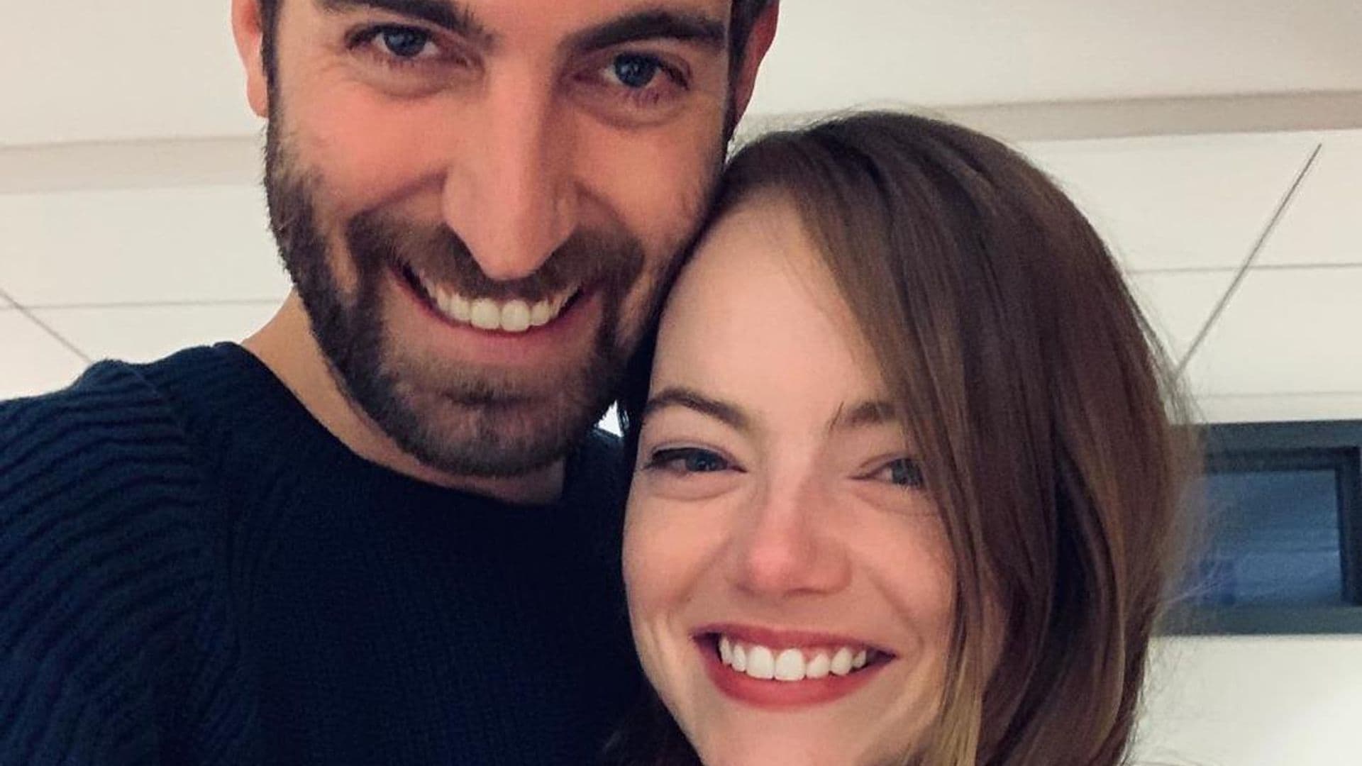 Emma Stones shows engagement ring with fiance Dave Mccary