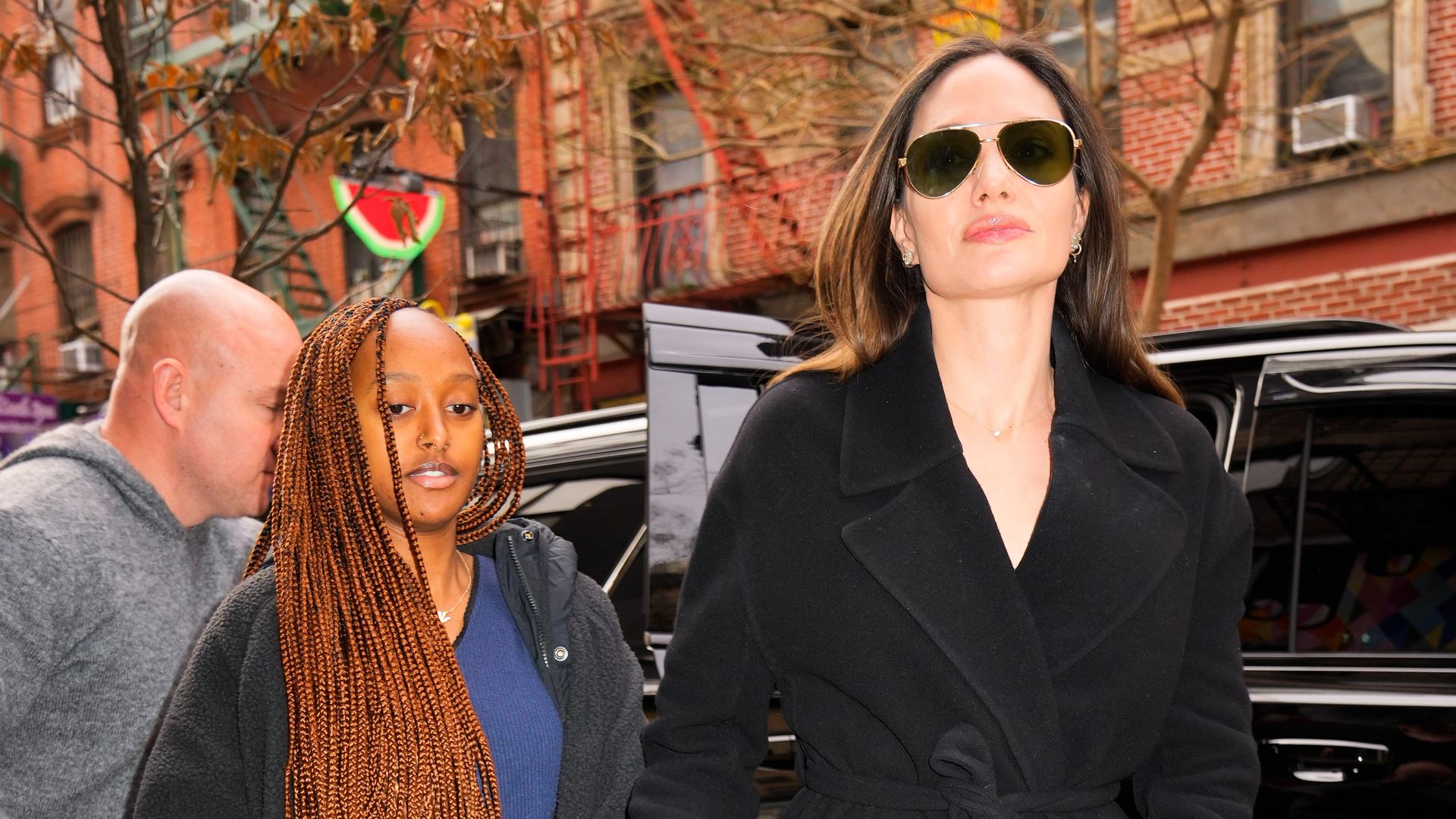 Angelina Jolie and daughter Zahara twinning with matching bags in Paris