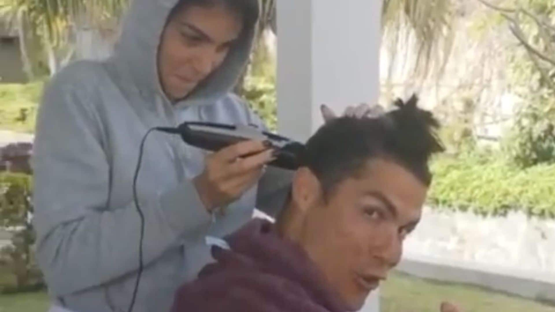 Cristiano Ronaldo's love Georgina nervously shaves his head: 'Danger is coming!'