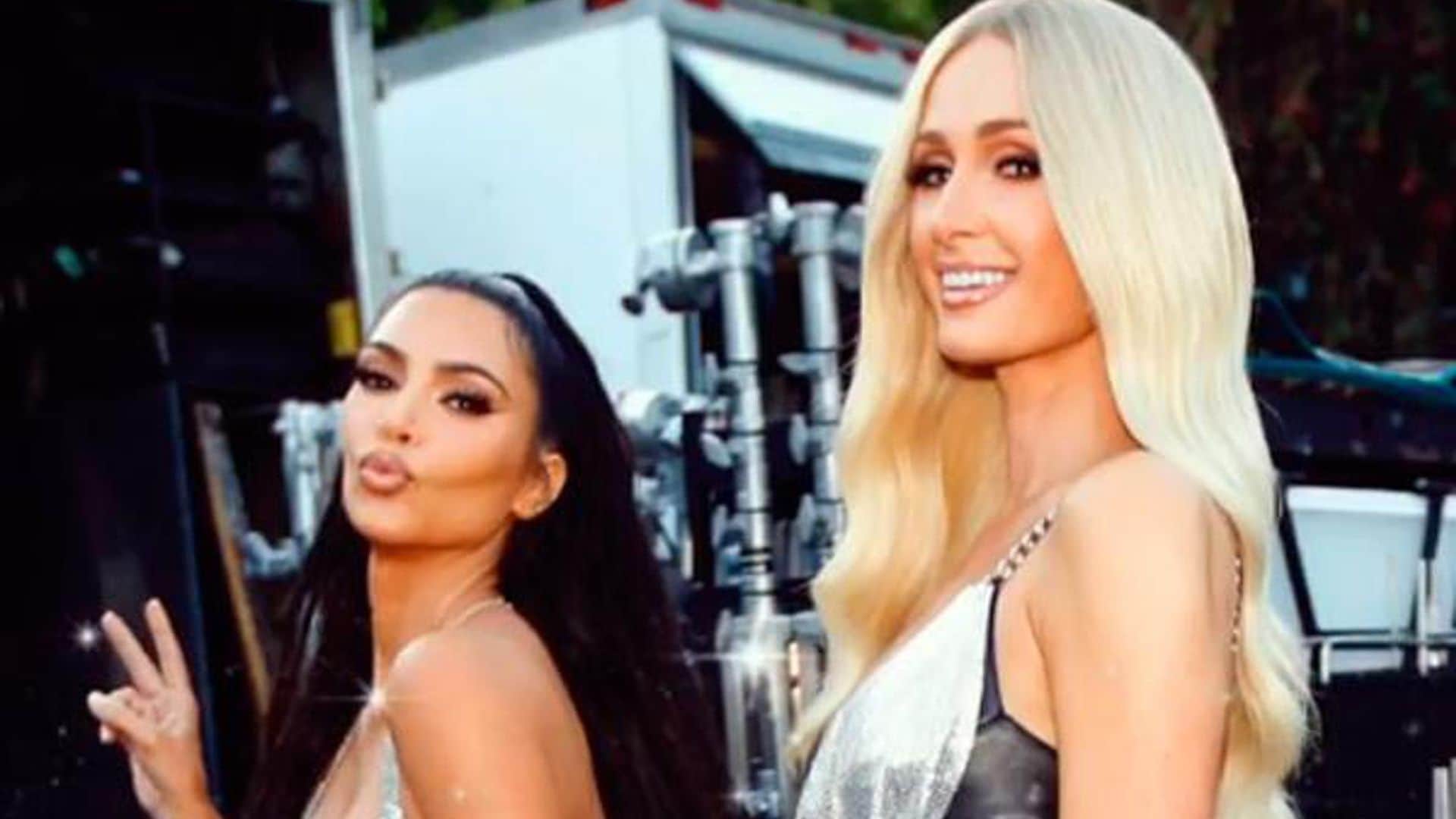 Paris Hilton and Kim Kardashian snow sled wearing couture gowns
