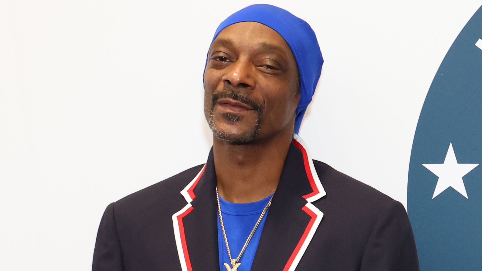 Snoop Dogg will carry the Olympic torch before Friday's opening ceremony