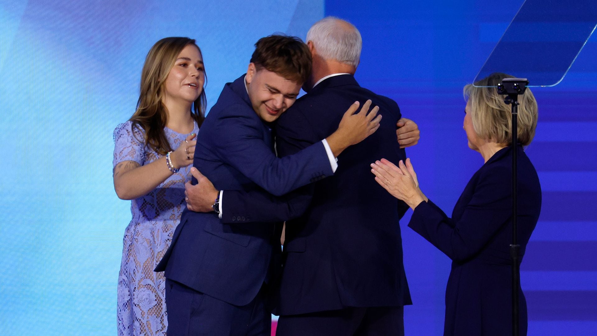 Tim Walz's teenage son, Gus, couldn't contain his tears after spotting his dad at the DNC