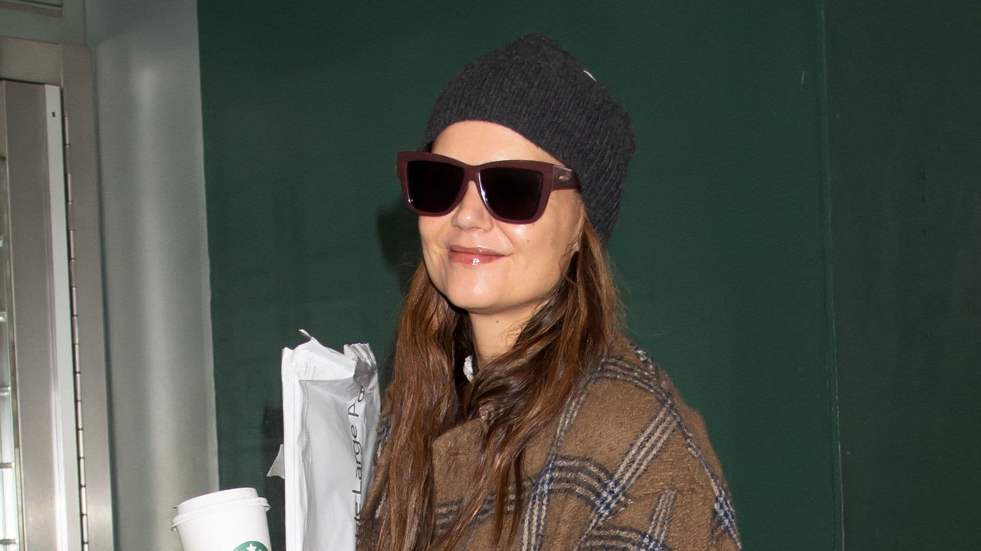 Katie Holmes hugs her costar as she nears the end of 'Our Town' on Broadway