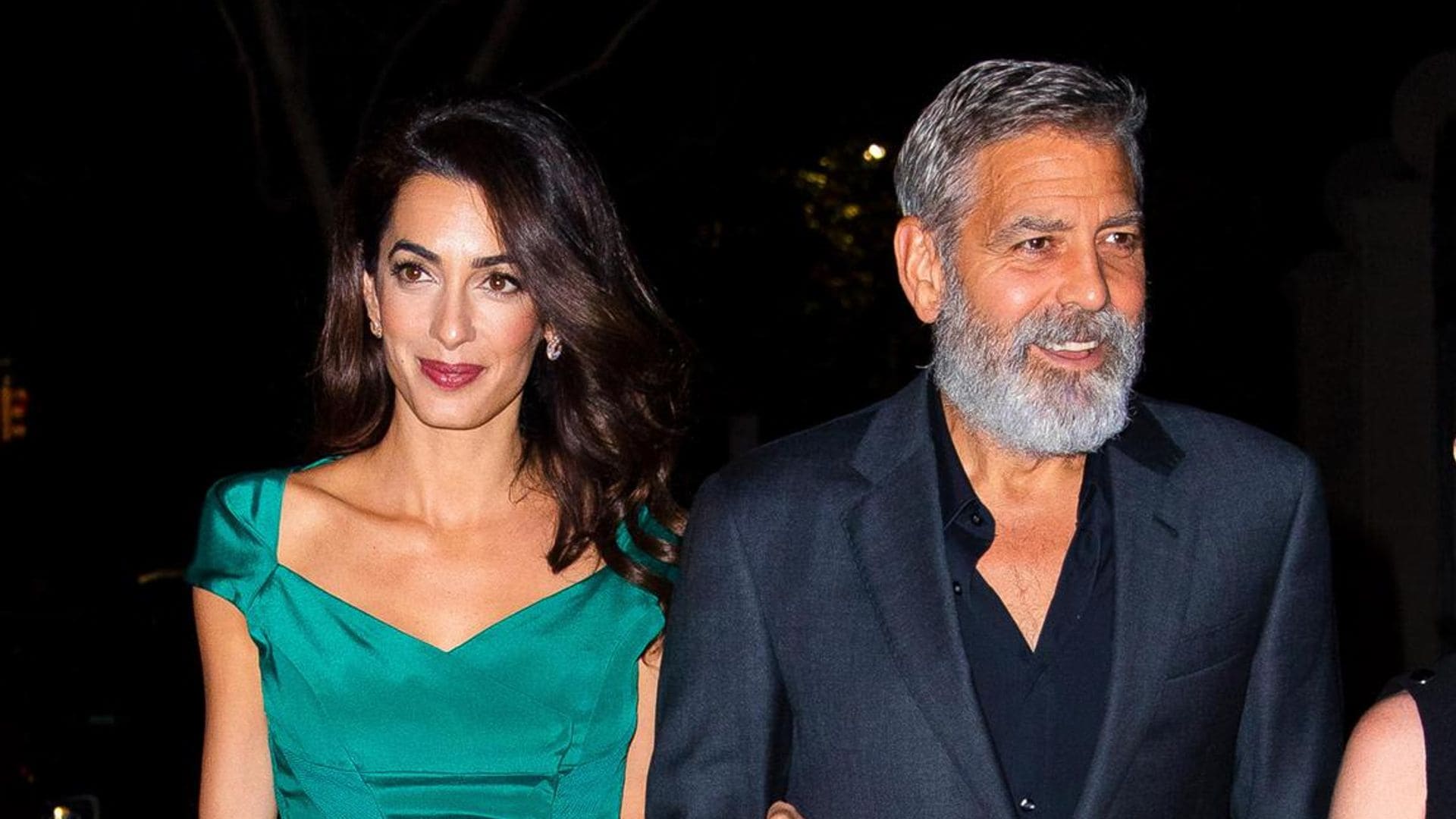 George and Amal Clooney jet over to the Canary Islands with their twins