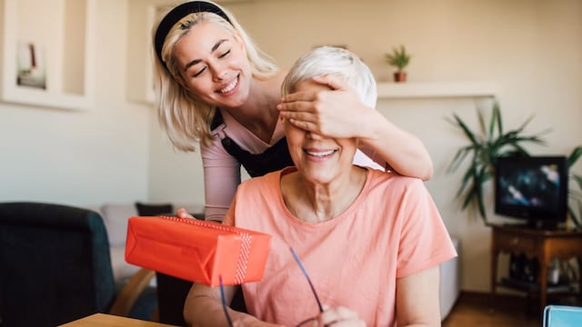 Daughter surprising her mom with a gift