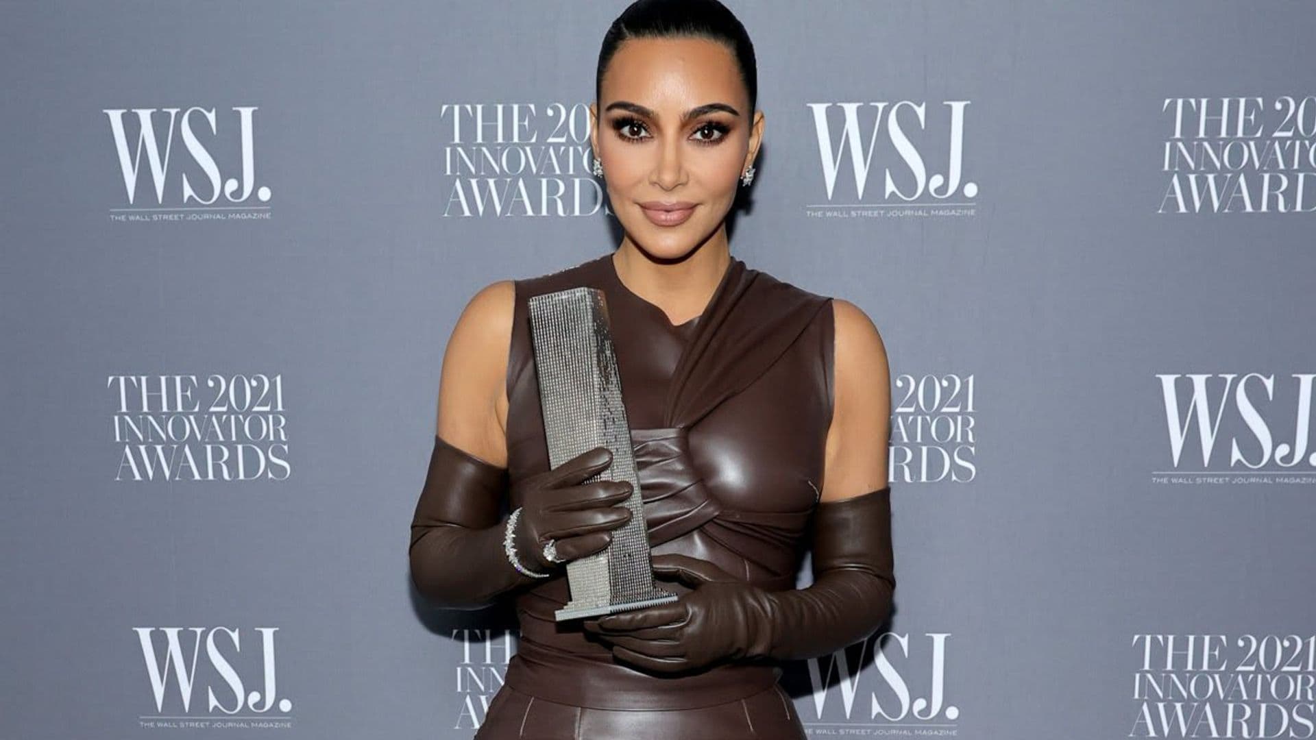 Kim Kardashian’s dress unzips before accepting the WSJ. Magazine’s 2021 Brand Innovator award