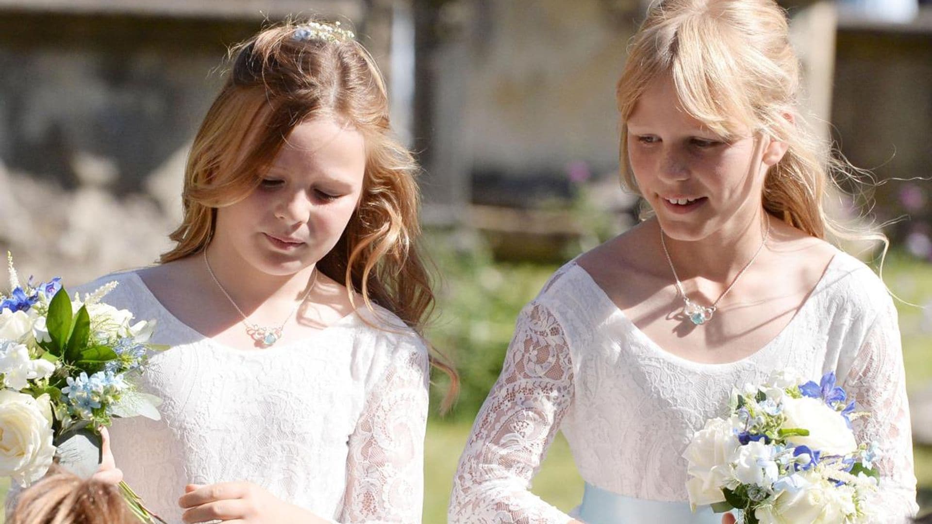 Queen Elizabeth’s great-granddaughters are adorable bridesmaids at family wedding