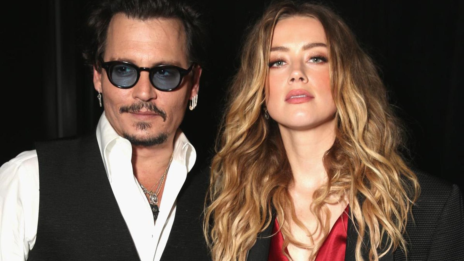 Amber Heard says she ‘absolutely’ still loves Johnny Depp