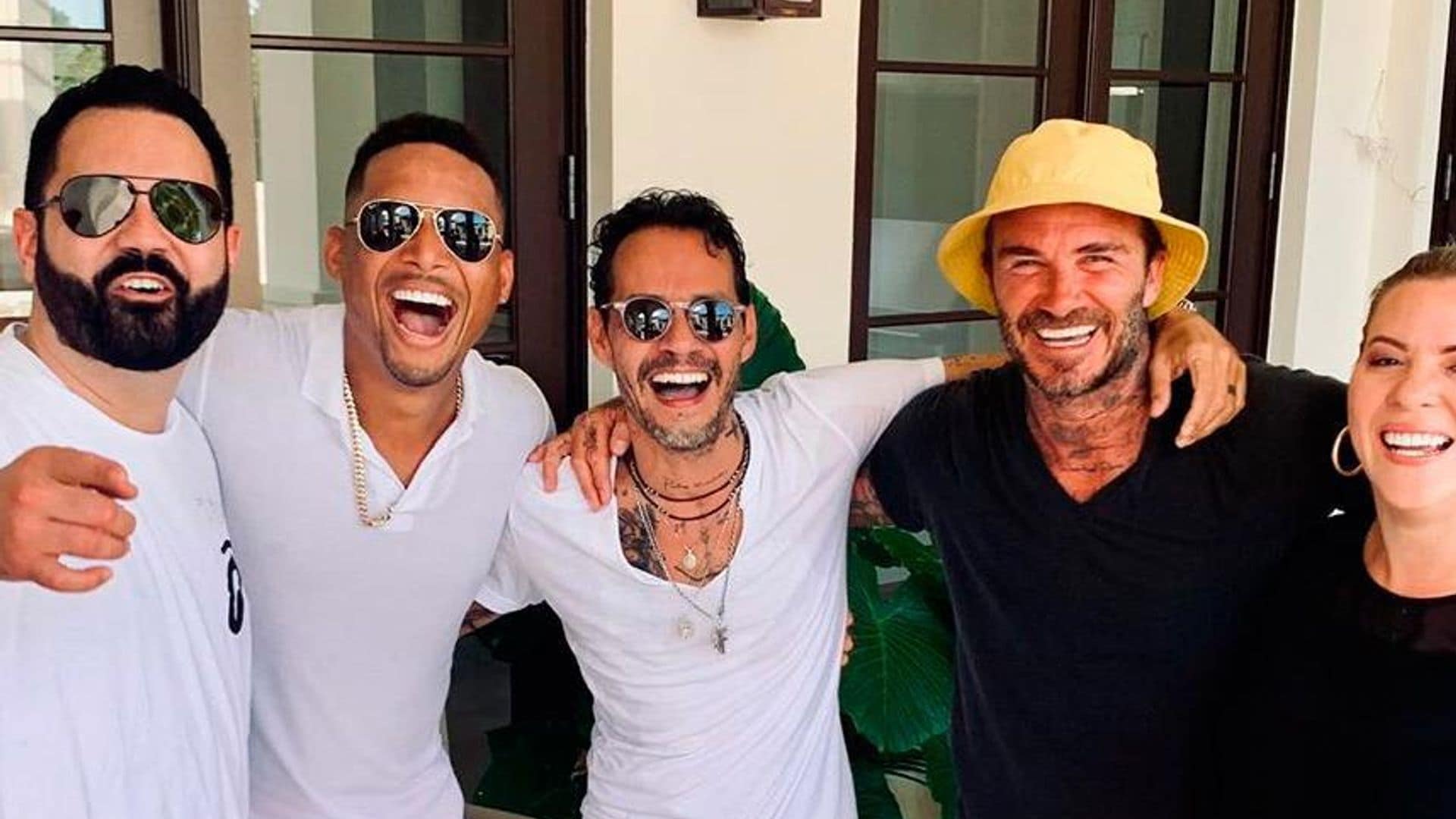 Marc Anthony teaches David Beckham some salsa moves