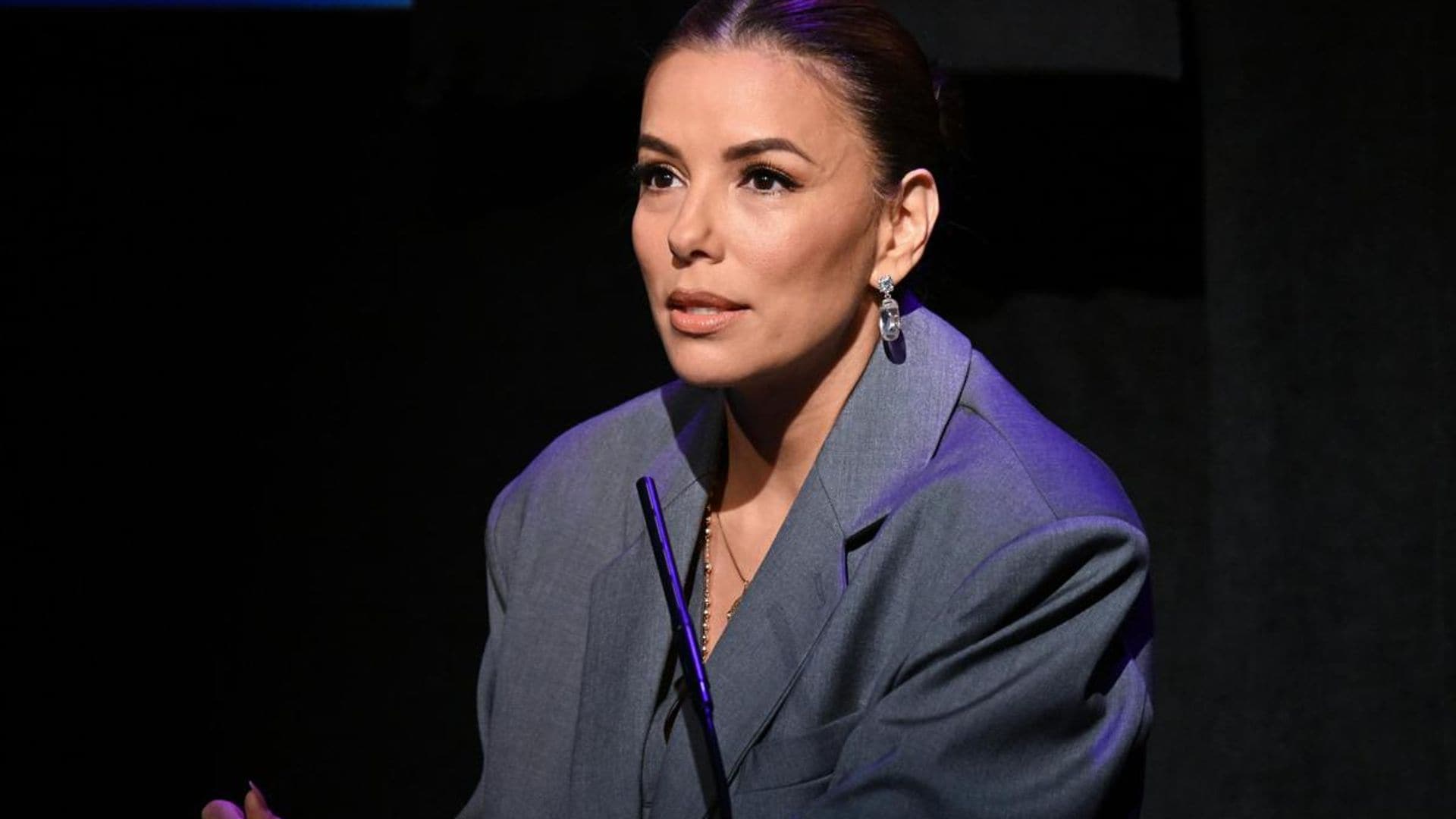 Eva Longoria means business in stylish gray suit and heels