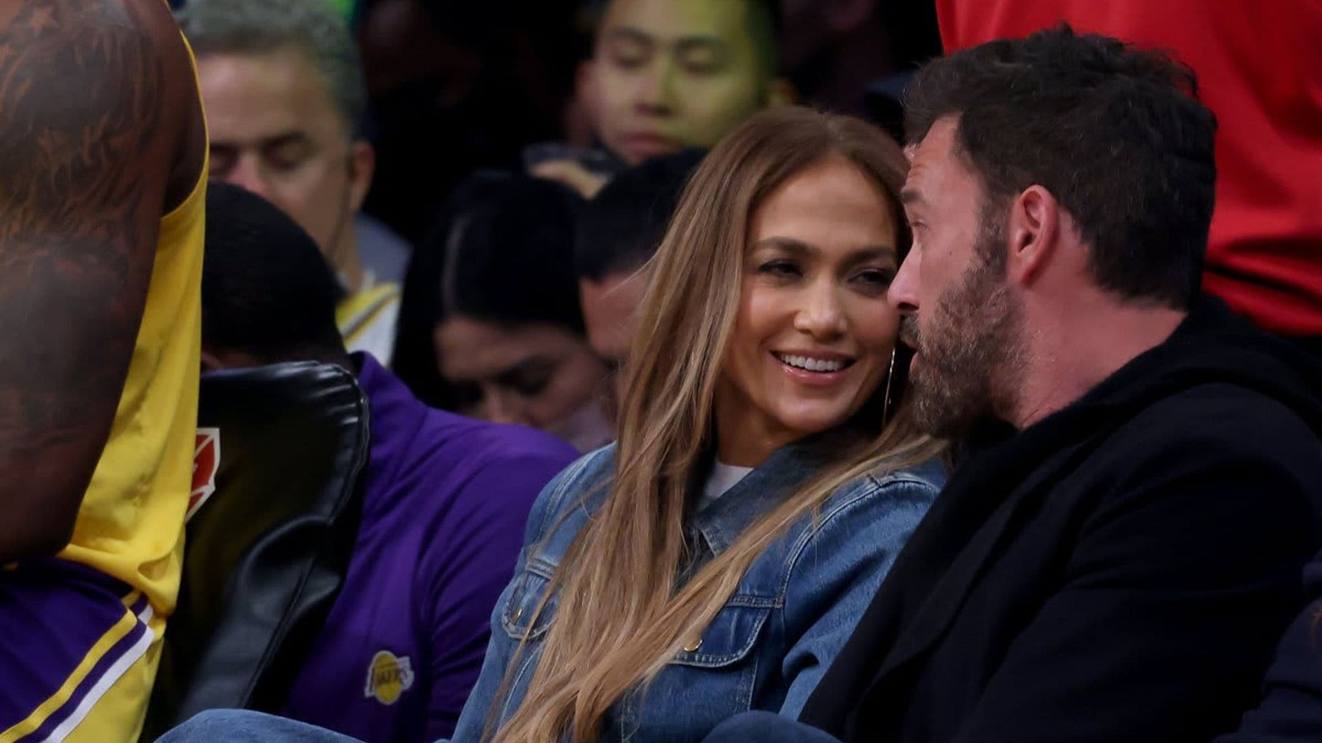 Jennifer Lopez and Ben Affleck sit courtside at a Lakers game