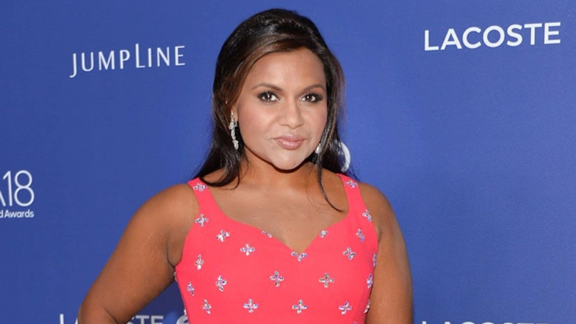 Mindy Kaling shows her Spanx before the 2016 Costume Designers Guild Awards